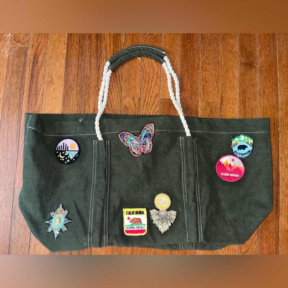 Brand NWOT Free People Sea serpent Canvas weekend Tote with Embroidered Patches